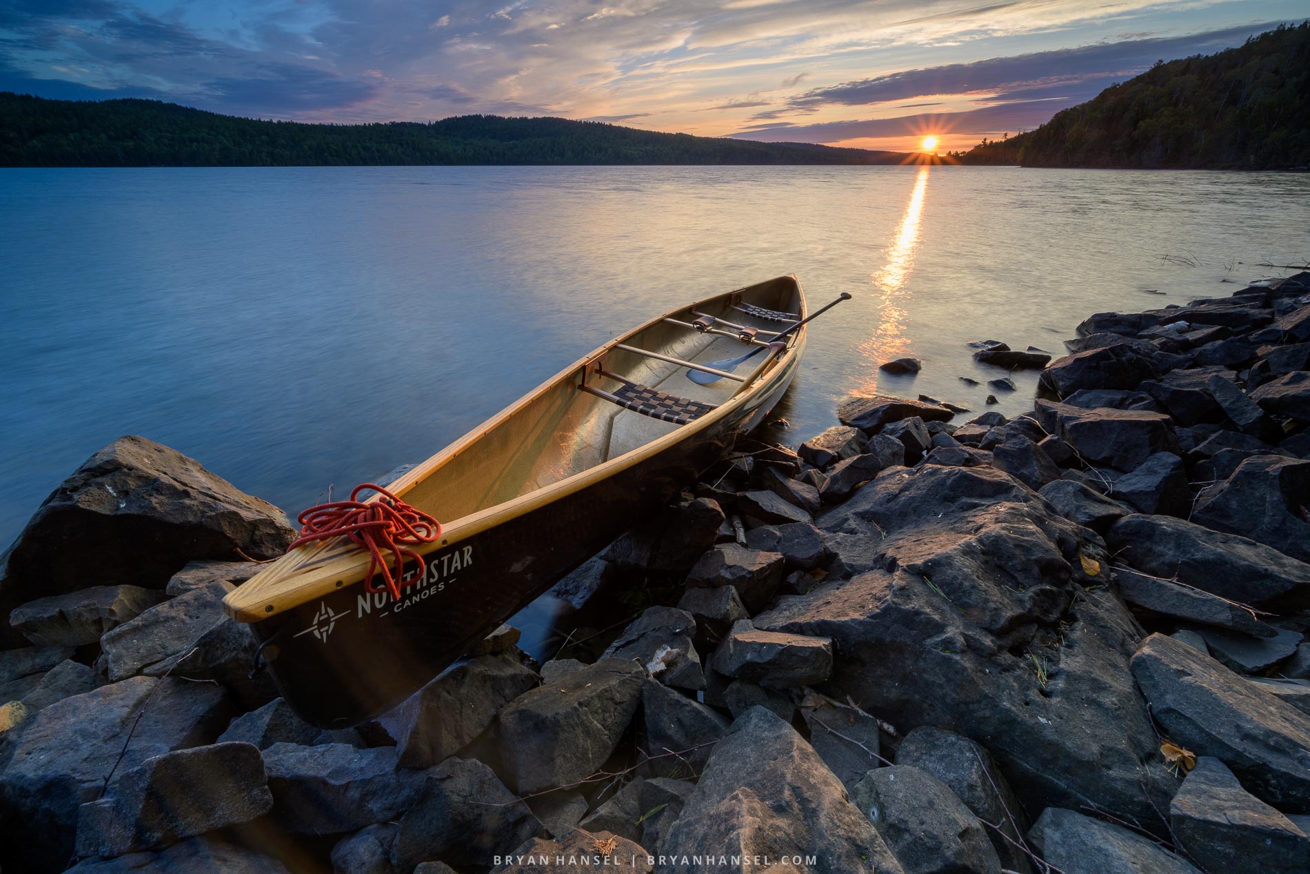 A canoe at sunrise in the Boundary Waters