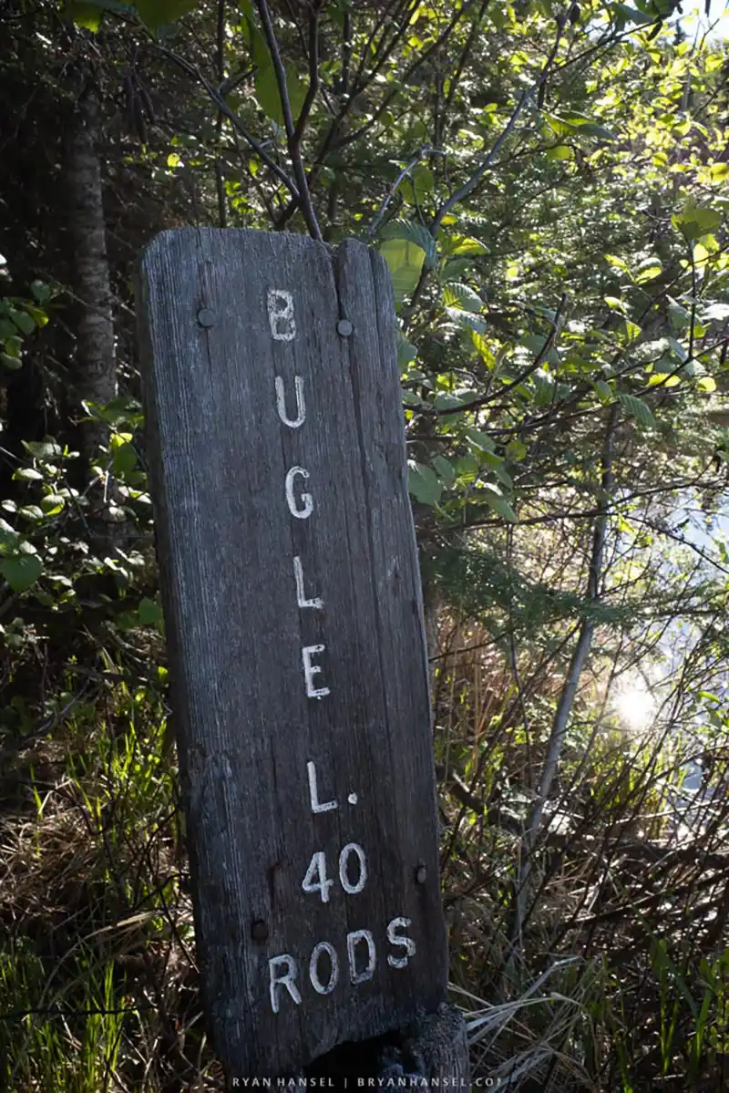 Old sign stating Bugle L. 40 Rods
